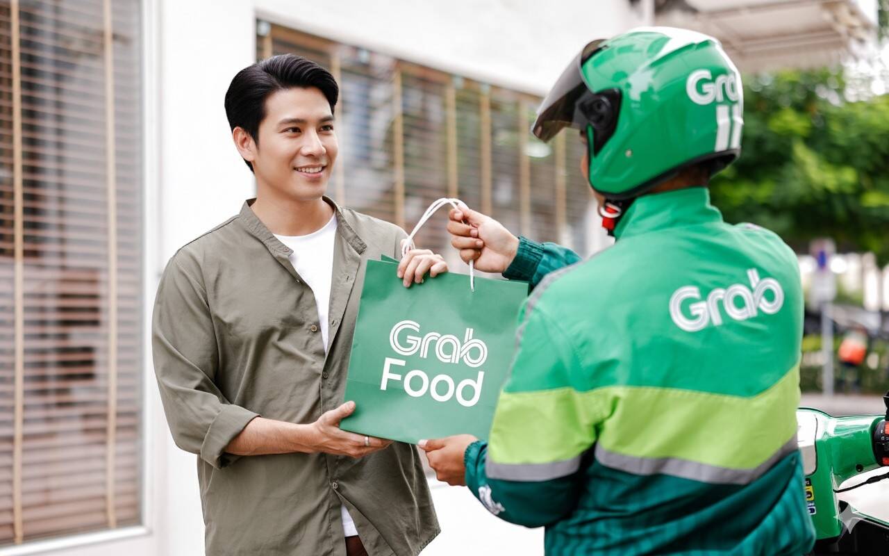 Grab อัดแคมเปญ "คนละครึ่งพลัส" หั่น GP เหลือ 7% วันแรก! พร้อมดันยอดร้านค้าสูงสุด 10,000 บาท และวงเงินสินเชื่อ 1 ล้านบาท